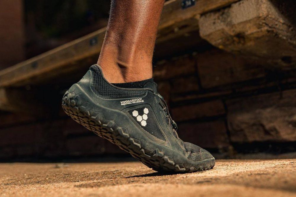 Picture of black vivobarefoot shoe on foot